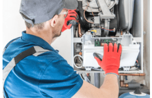 technical works on the internal wiring during a water heater repair service call