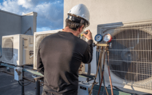 technician repairing ac