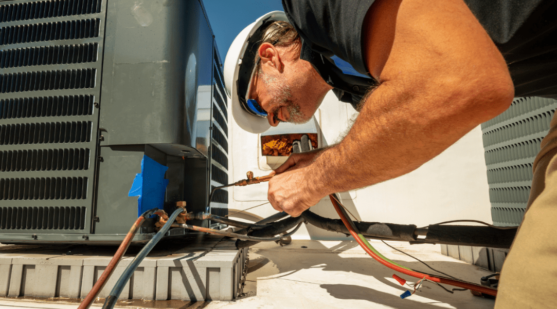 tech installing AC